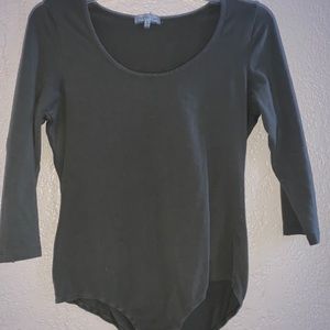 A navy green body suit.